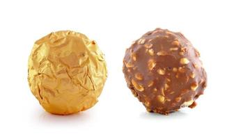 Chocolate ball with almond on white background. photo