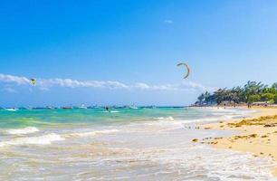 Water sport like kitesurfing kiteboarding wakeboarding Playa del Carmen Mexico. photo