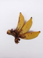 Top view portrait three yellow ripe bananas isolated on white background photo