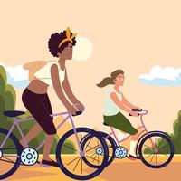 mujeres en bicicleta vector