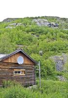 Antigua cabaña de madera marrón en Hemsedal, Noruega. foto