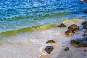 Flamengo Beach boulders blue water waves Rio de Janeiro Brazil. photo