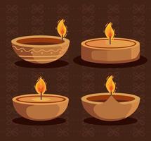 cuatro iconos de velas de diwali vector