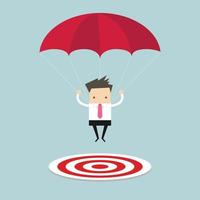 Businessman with parachute focused on a target. vector