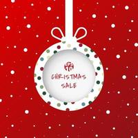 Christmas decorations ball cut from paper with white snow on red background vector
