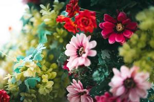 Close-up. Colorful bouquet of different fresh flowers. Rustic flower background. Retro style. Bouquet of multicolored flowers background. Vintage photo. photo