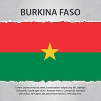 bandera de burkina faso en papel rasgado vector