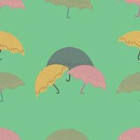 pretty colorful umbrella patterns with green background vector