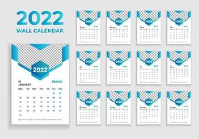 diseño de calendario de pared 2022. diseño de calendario de pared 2022. diseño de calendario de año nuevo 2022. la semana comienza el lunes. plantilla para calendario anual 2022 vector