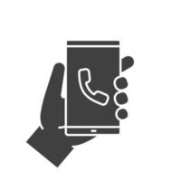 Hand holding smartphone glyph icon. Silhouette symbol. Smart phone incoming call. Negative space. Vector isolated illustration