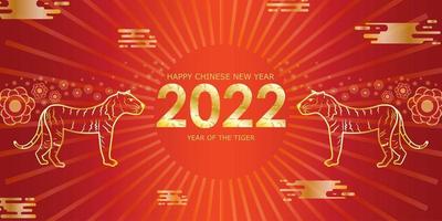Two golden tigers on a gradient background with tiger numbers 2022 and happy Chinese New Year. vector