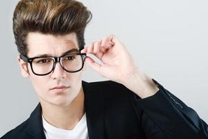 Young man with eyeglasses photo