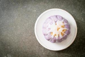taro bun with white sugar cream and nut photo