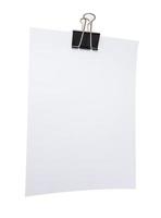 White note paper with paperclip on white background.