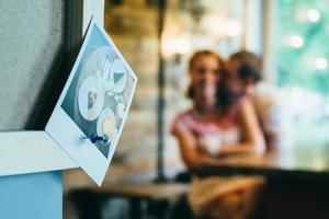 guy and a girl meeting in a city cafe photo