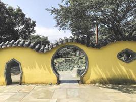 Yellow art fence on Jeju island. South Korea photo