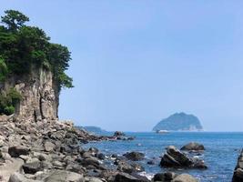 The beautiful rocky coast on Jeju Island, South Korea photo