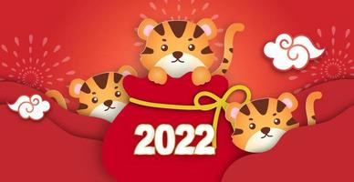 Chinese new year 2022 year of the tiger banner in paper cut style vector