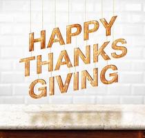 Happy Thanksgiving wood texture on marble table with white ceramic tile wall photo