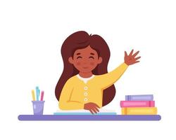 Girl raising hand to answer. Child sitting at a desk with school supplies vector