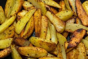 Background of homemade fried potatoes photo