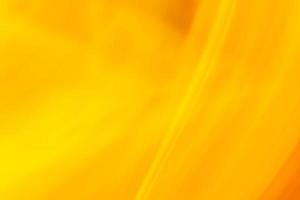 Abstract yellow background with diagonal gradient lines. photo