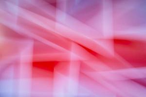 Abstract red pink lilac background made of sharp lines. Simulate pain and speed. photo