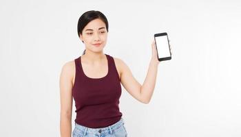 Smiling asian japanese woman hold black smartphone or cellphone isolated on white background texture.advertising concept. Positive face expression human emotion. Copy space. photo