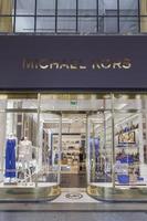 TURIN, ITALY, JUNE 3, 2015 - View at Michael Kors shop in Turin, Italy. Michael Kors  is a New York City-based fashion designer widely known for designing classic American sportswear for women. photo
