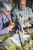 Senior couple in a carpentry photo