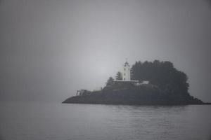 Five Finger Lighthouse in Fog, Alaska photo