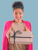 Happy and cheerful afro american woman with present box photo