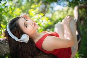 Beautiful young woman with headphones photo