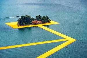 The floating piers. The artist Christo walkway on Lake Iseo St.Paul island. photo