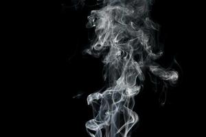 white smoke on black background photo