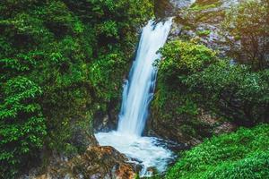 Travel the highest waterfall in Chiangmai Mae-pan waterfall rainy season forest at Doi intanon photo