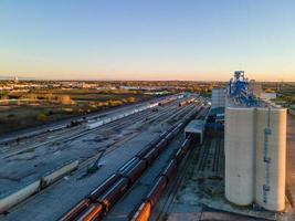 aerial view at dusk of train marshaling yard at end of day