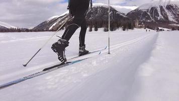 A woman practices Nordic skiing with classical technique video