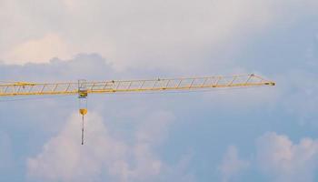 construction crane over blue sky photo