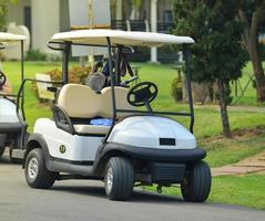Golf carts on a golf course photo