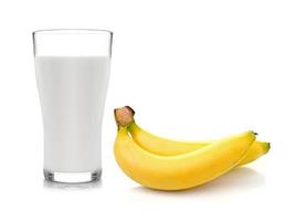 Glass of milk  with  banana over white background photo