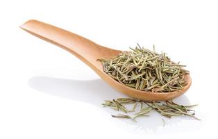 Dried rosemary leaves on white background photo