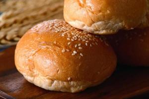 Bread in wood plate photo