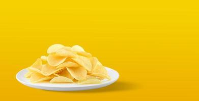 Potato chips in a plate on yellow background. with Copy space for your text. photo