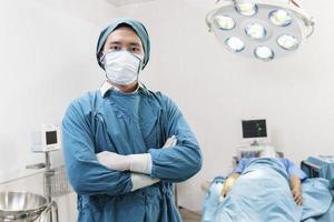 portrait of two surgeons standing in the operating room. Surgery and emergency concept photo