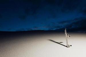 Powder texture and snowboard at sunset photo