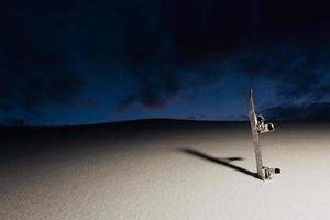 Powder texture and Equipment for snowboarding at sunset photo