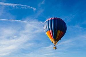 Colorful hot air balloon in blue sky