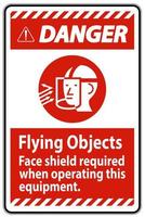 señal de peligro, objetos voladores, se requiere protección facial al operar este equipo vector
