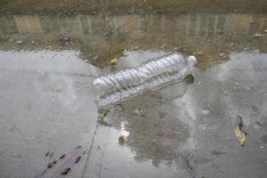 Floating plastic bottles flooded the village streets. photo